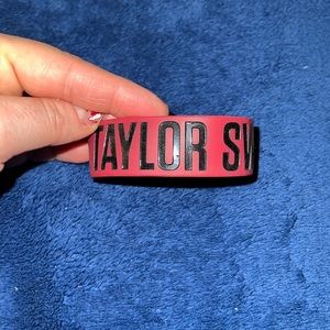NWOT Taylor Swift “Red” Rubber Bracelet
